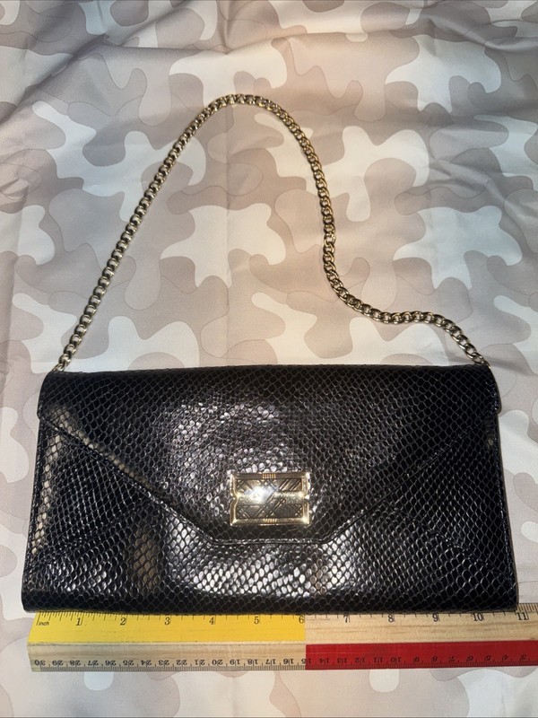 Daks Embossed Black Leather Handbag