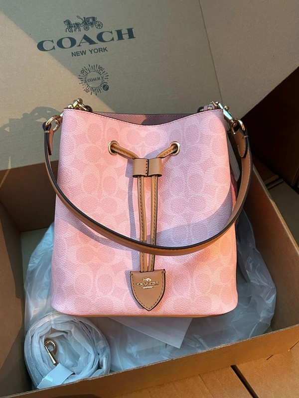 Coach CEA23 Rowan Bucket Bag In Signature Canvas With Charms Powder Pink gallery