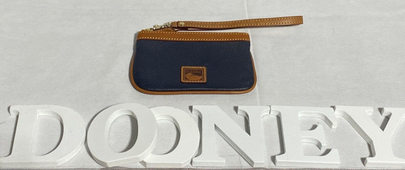 Dooney & Bourke Wristlet w/Solid Navy Blue Leather and Vachetta Logo & Trim