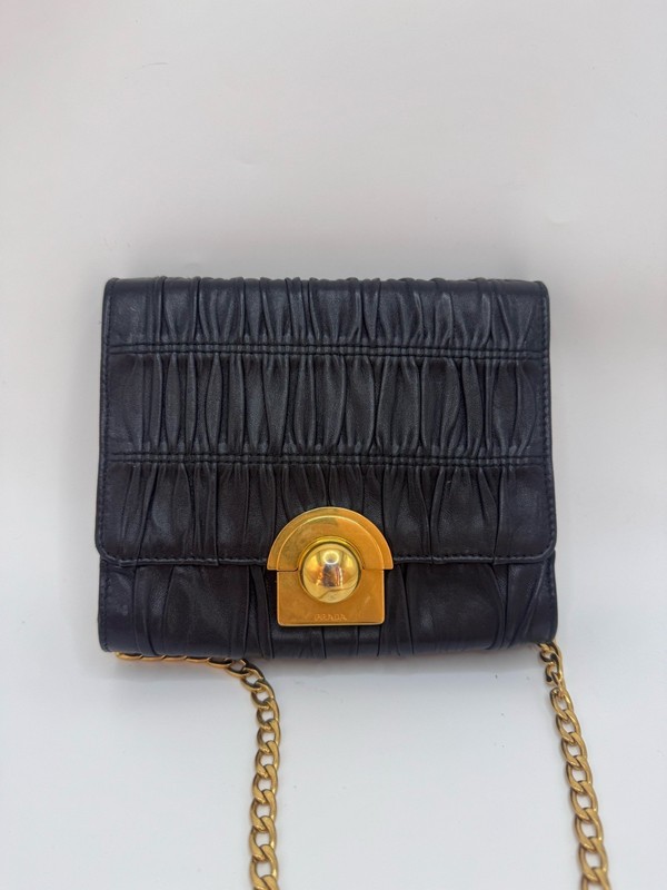 Prada black gold pleated chain bag with mirror sheepskin normal use traces