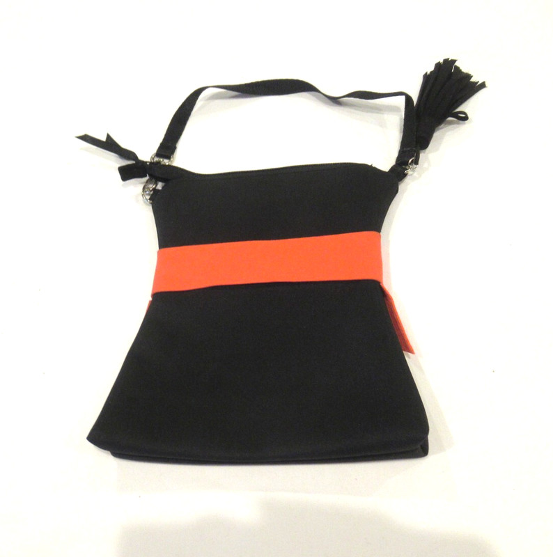 Black purse with red bow and black tassel, evening bag gallery