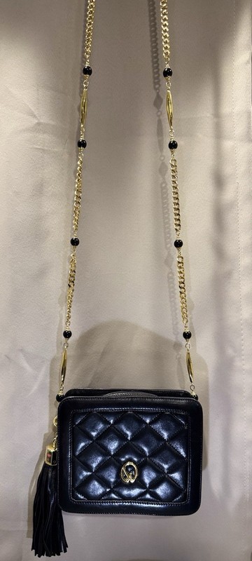 St. John black quilted crossbody with gold beaded chain and leather tassel