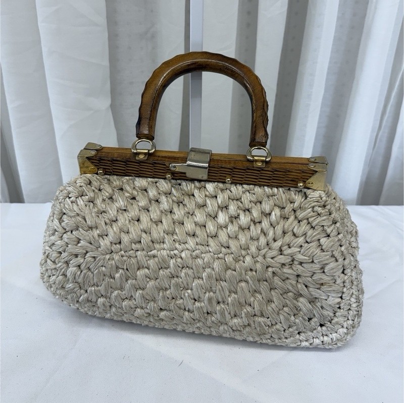 The Bag Beige Woven Straw Top Handle Bag Wood Frame Clasp Closure Lined