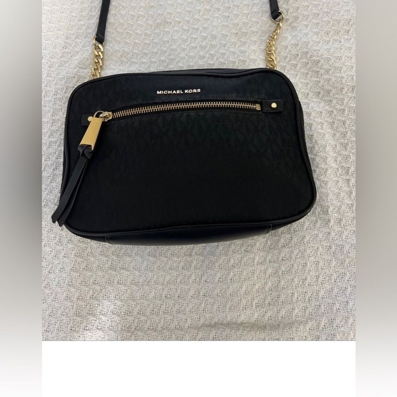 Michael Kors Polly crossbody bag, features polished gold-tone chain-link accents