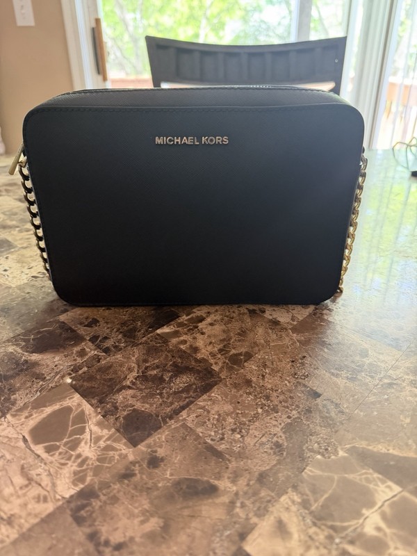 Michael Kors Black Leather Crossbody Bag. Gold Chain Strap Accent.