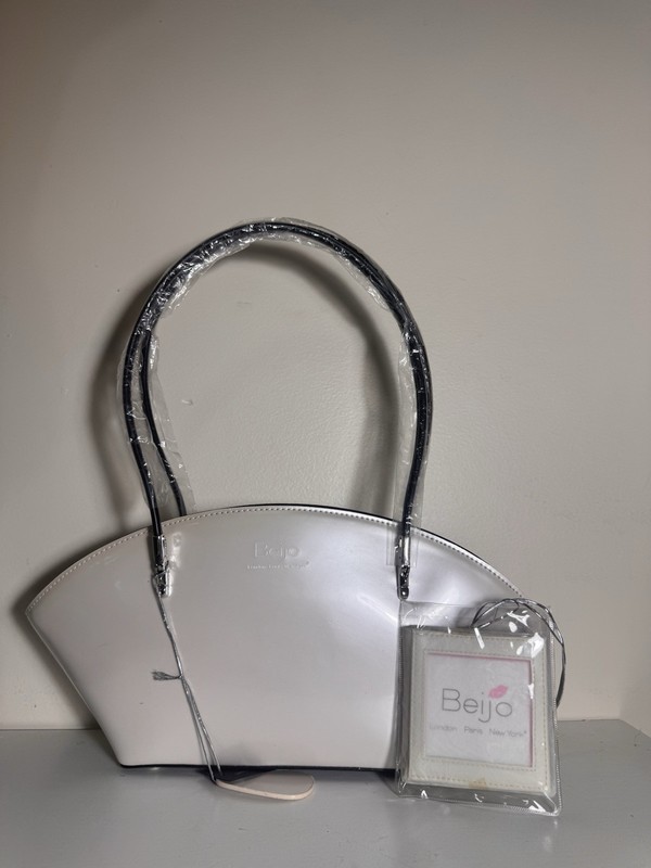 Beijo White Patent Crescent Top Handle Satchel Bag Black Handles Zip Lined