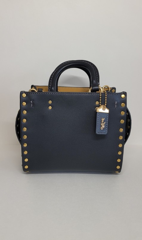 COACH ROGUE 17 WITH RIVETS