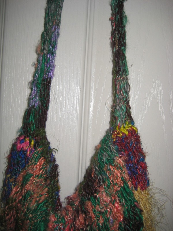 Handmade colorful handbag. Lined w attached closure Crocheted /knitted. gallery