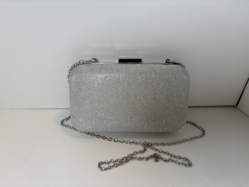 Silver glitter clutch bag with removable chain strap by Jessica McClintock
