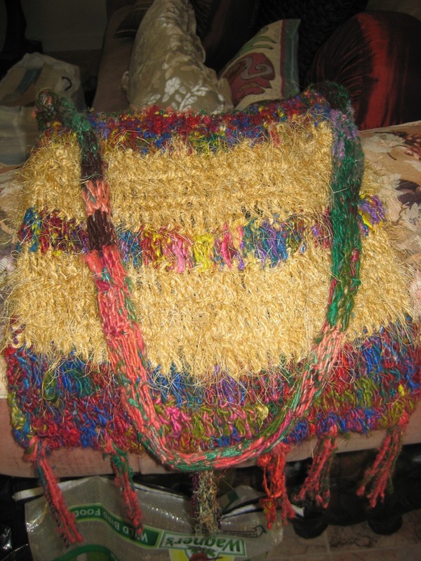 Handmade colorful handbag. Lined w attached closure Crocheted /knitted. gallery
