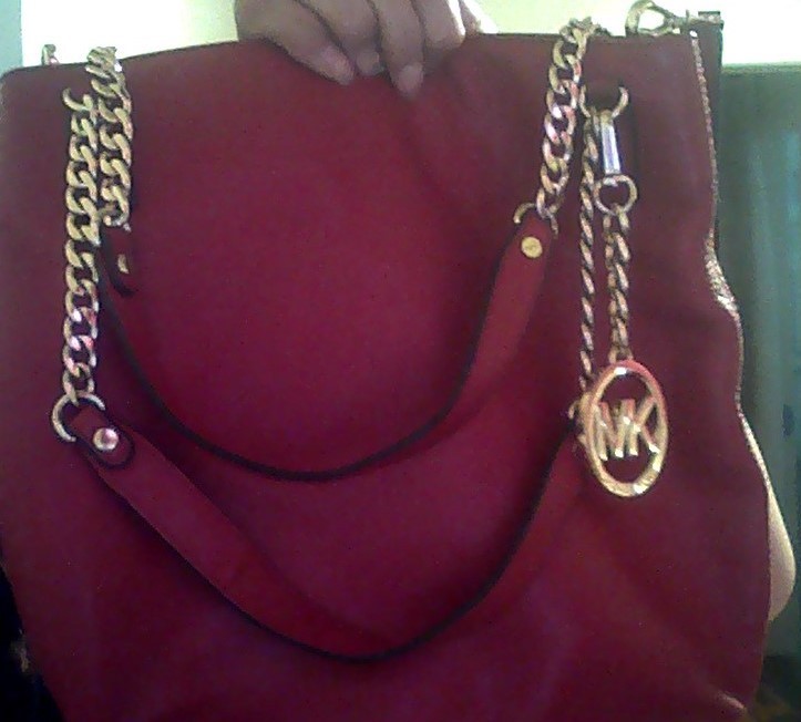 Michael Korr PVC red used handbag some wear and tear no damage inside