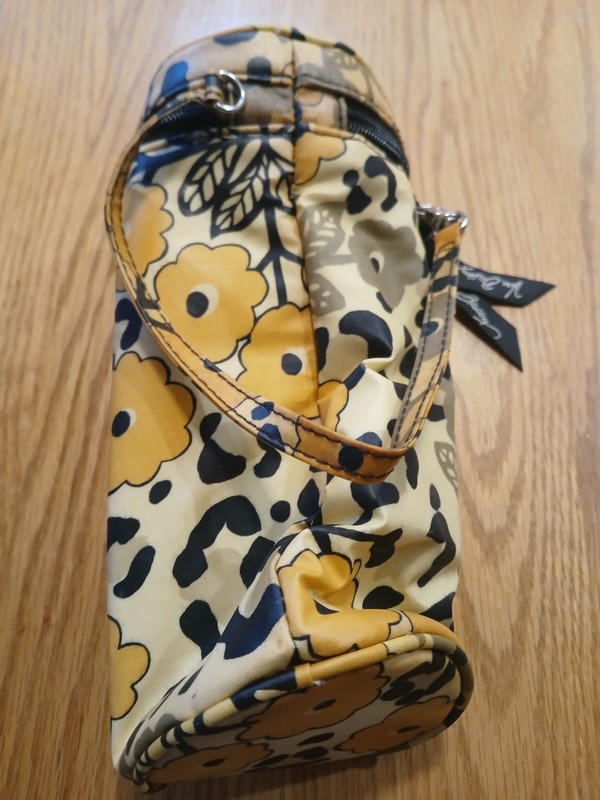 Vera Bradley Soft Shell Case With Zipper Closure.