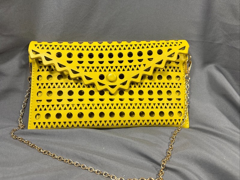 Stella and Dot like Sunshine Yellow Laser Cut Clutch Purse with shoulder strap gallery