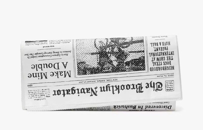 KATE SPADE Glitzy Ritzy Newspaper Clutch