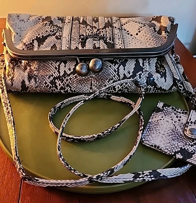 Evening Clutch /Handbag By Jessica Simpson Snake -Skin Print. NWOT. 11x9x1” Soft