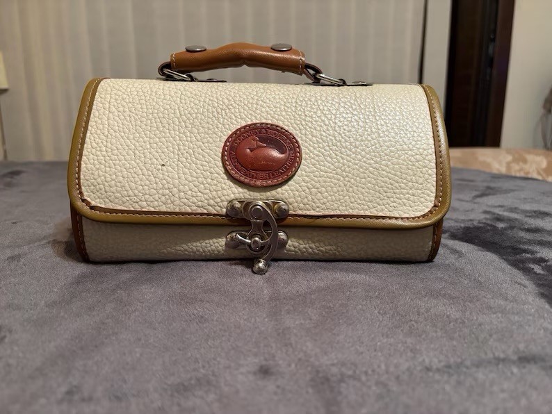 Vintage Dooney & Bourke All Weather Leather Barrel Bag, 10″ by 5″ by 5″