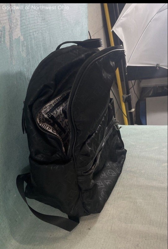 Juicy Couture Black Embossed Backpack with Logo, Heart Charm, Zipper Accent