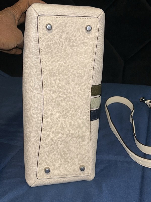 Coach Lillie carryall bag with varsity stripes in a creamy white/eggshell color gallery