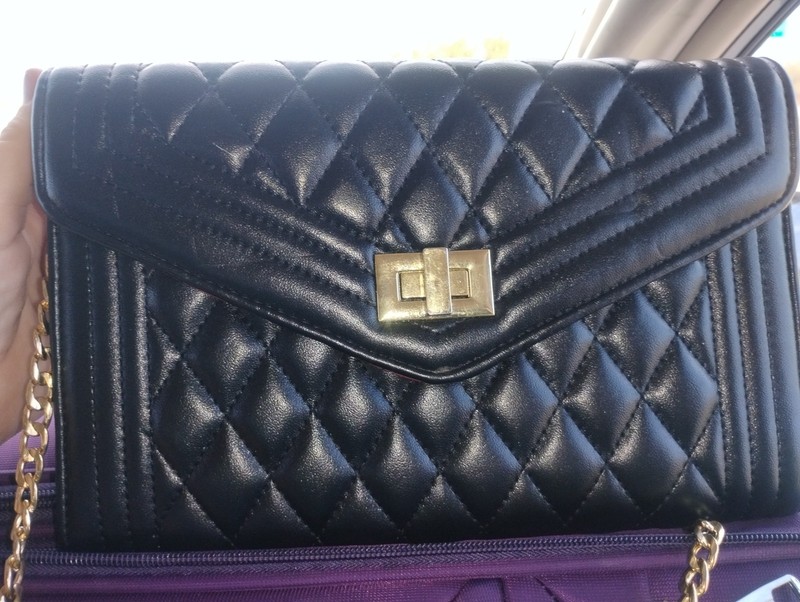 Black quilted pattern purse with gold chain