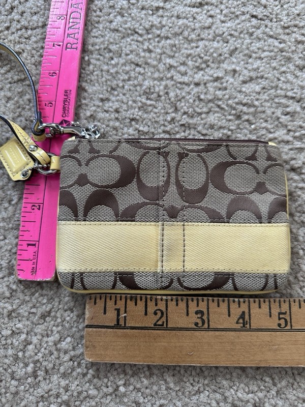 Coach Signature Light Yellow Striped and Canvas Wristlet With Monogram