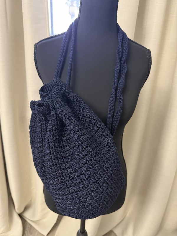 The SAK Crocheted Backpack Cinch-top Boho Navy Blue Braided Strap Bag Festival
